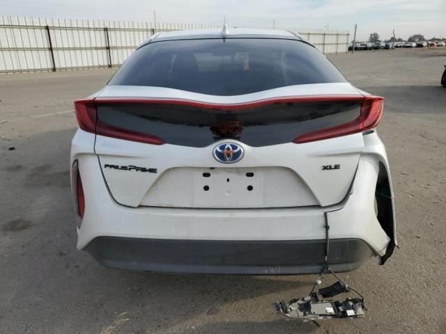 Photo 6 from auction – 2021 TOYOTA PRIUS PRIM with VIN JTDKAMFP2M3194049