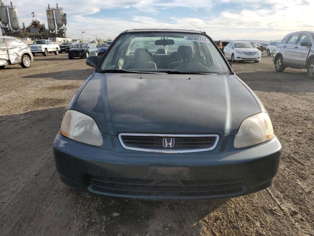 Photo 5 from auction – 1997 HONDA CIVIC EX with VIN JHMEJ8643VS005702