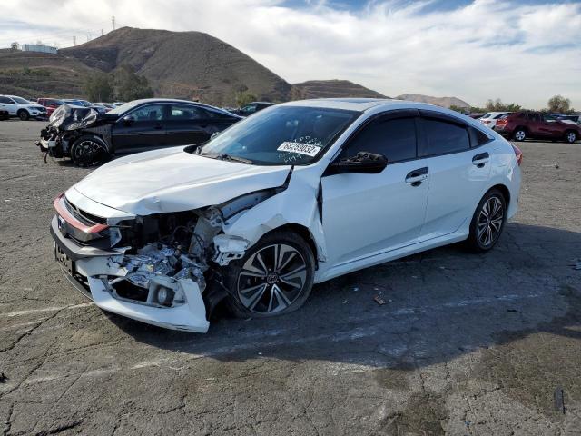 Photo 1 from auction – 2018 HONDA CIVIC EX with VIN JHMFC1F38JX006144
