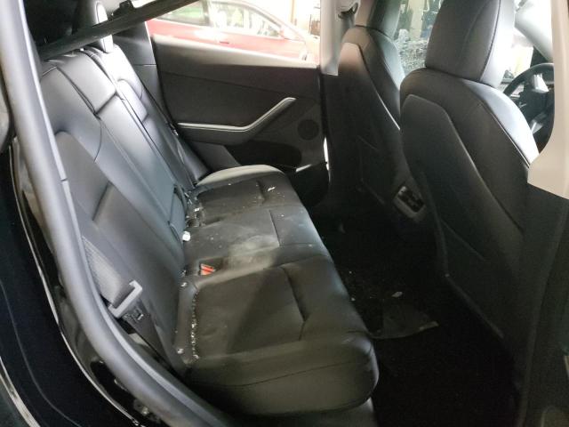 Photo 11 from auction – 2022 TESLA MODEL Y with VIN 7SAYGDEF0NF546974