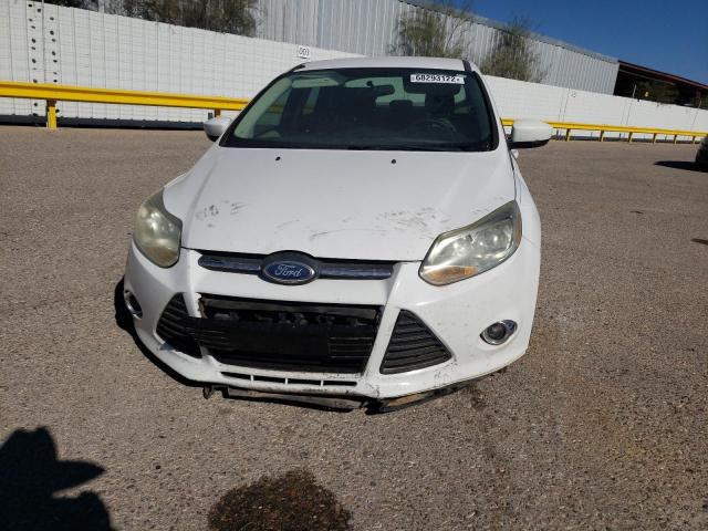 Photo 5 from auction – 2012 FORD FOCUS SE with VIN 1FAHP3F24CL131000