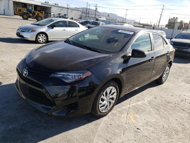 TOYOTA COROLLA L 2017 with VIN 5YFBURHE4HP716094 - Photo from auction