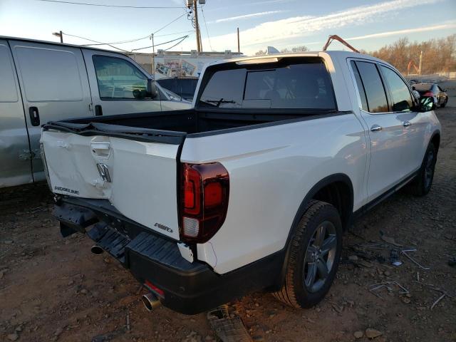 Photo 3 from auction – 2022 HONDA RIDGELINE with VIN 5FPYK3F73NB034579