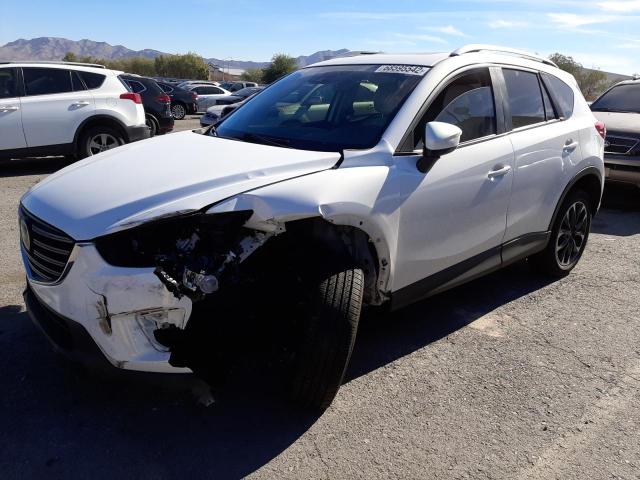 MAZDA CX-5 GT 2016 with VIN JM3KE4DY0G0727027 - Photo from auction