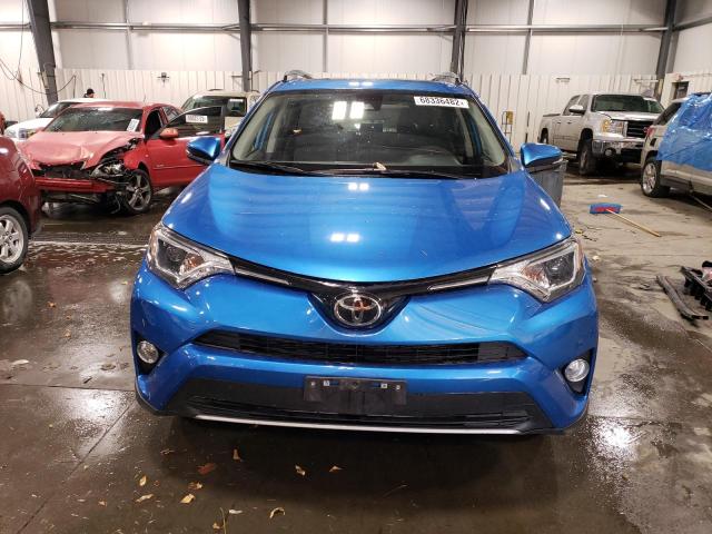 Photo 5 from auction – 2017 TOYOTA RAV4 XLE with VIN JTMRFREV8HJ120598