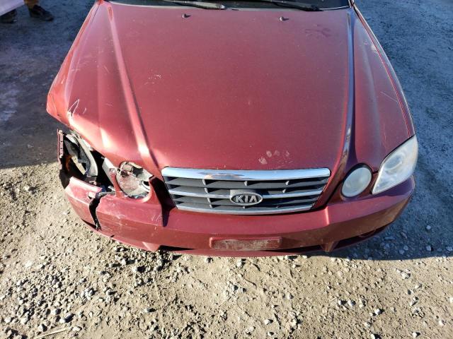 Photo 11 from auction – 2006 KIA OPTIMA LX with VIN KNAGD126165449688