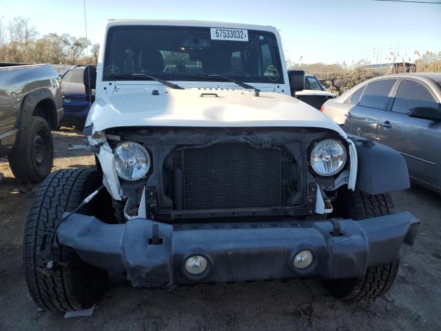 Photo 5 from auction – 2016 JEEP WRANGLER U with VIN 1C4BJWDG2GL127034