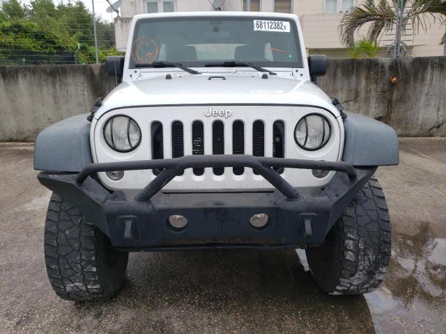 Photo 5 from auction – 2015 JEEP WRANGLER U with VIN 1C4BJWDG4FL510438