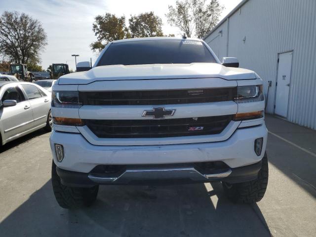 Photo 5 from auction – 2018 CHEVROLET SILVERADO with VIN 3GCUKREC6JG483851