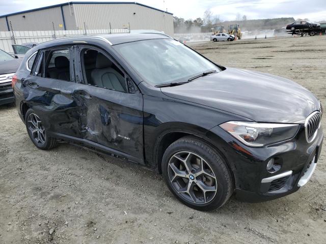 Photo 4 from auction – 2017 BMW X1 XDRIVE2 with VIN WBXHT3C37H5F76447