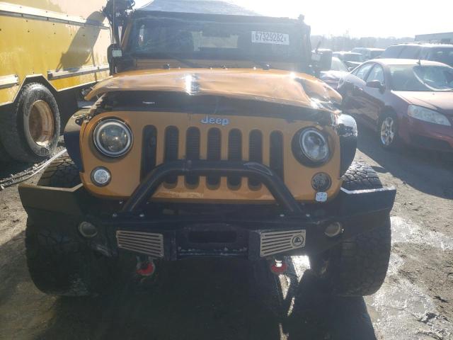 Photo 5 from auction – 2014 JEEP WRANGLER U with VIN 1C4BJWDG0EL325110