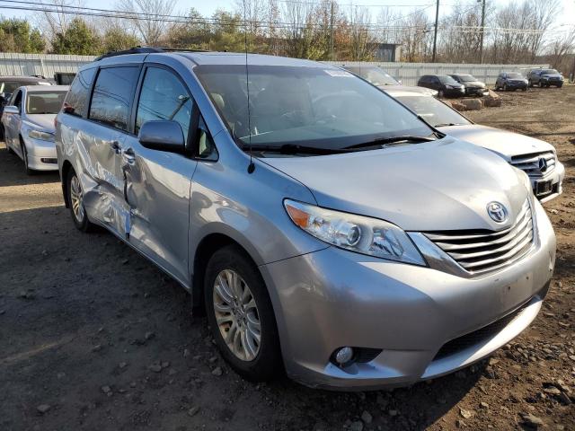 Photo 4 from auction – 2014 TOYOTA SIENNA XLE with VIN 5TDYK3DC2ES485376
