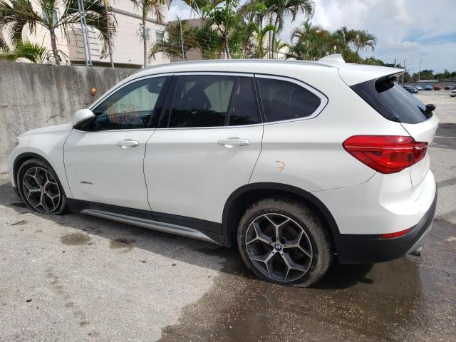 Photo 2 from auction – 2018 BMW X1 XDRIVE2 with VIN WBXHT3Z39J4A66555