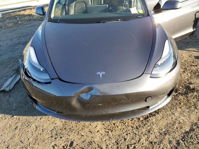 Photo 11 from auction – 2023 TESLA MODEL 3 with VIN 5YJ3E1EA0PF398294