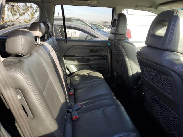 Photo 11 from auction – 2004 HONDA PILOT EXL with VIN 2HKYF18704H520684