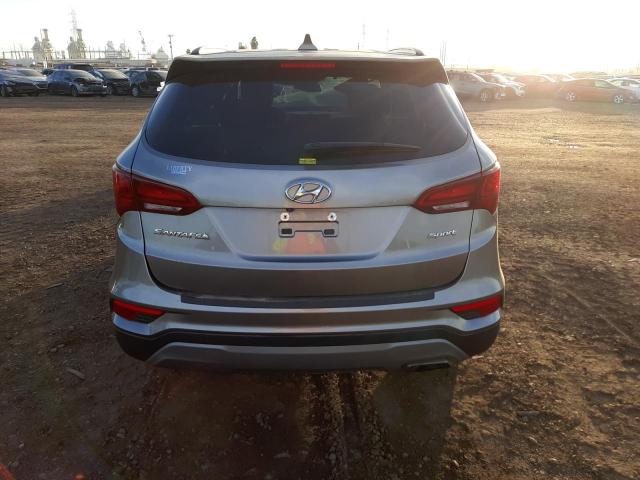 Photo 6 from auction – 2018 HYUNDAI SANTA FE S with VIN 5NMZU3LB8JH053749