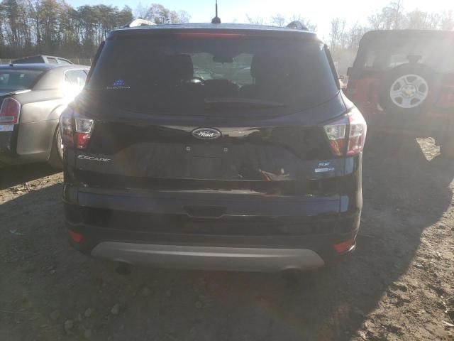 Photo 6 from auction – 2018 FORD ESCAPE SE with VIN 1FMCU9GD6JUB68357
