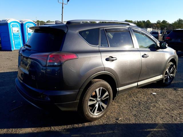 Photo 3 from auction – 2017 TOYOTA RAV4 XLE with VIN JTMRFREV1HD199286