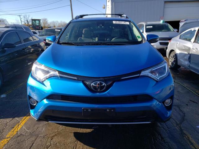 Photo 5 from auction – 2017 TOYOTA RAV4 XLE with VIN JTMRFREV7HJ166603