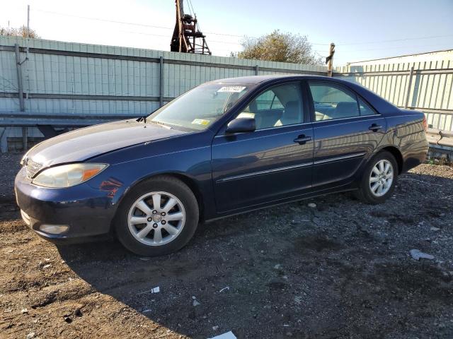 TOYOTA CAMRY LE 2004 with VIN 4T1BF30K64U080313 - Photo from auction