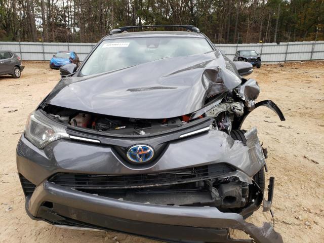 Photo 5 from auction – 2018 TOYOTA RAV4 HV LE with VIN JTMRJREV8JD214483