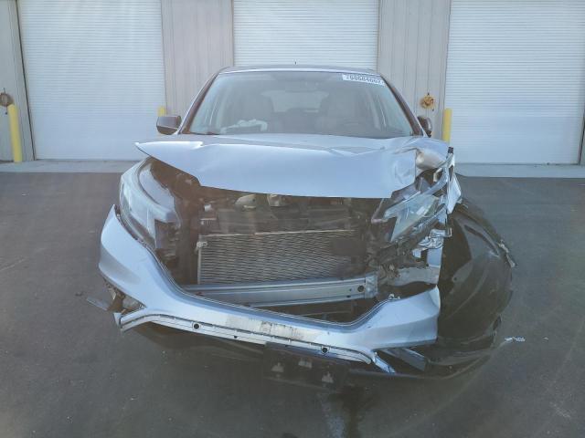Photo 5 from auction – 2016 HONDA CR-V SE with VIN 5J6RM4H4XGL024027