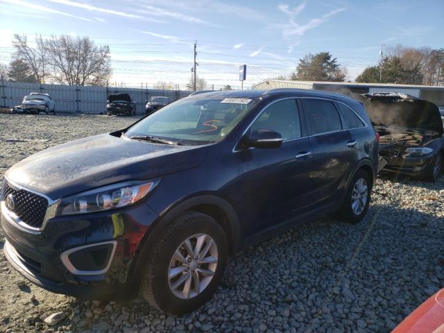 KIA SORENTO LX 2017 with VIN 5XYPG4A37HG304622 - Photo from auction