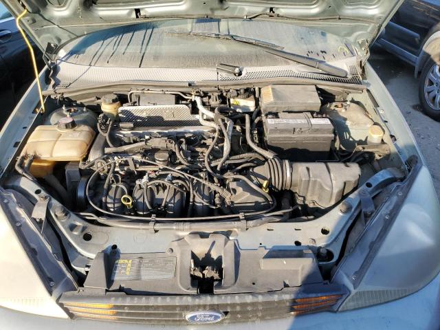 Photo 11 from auction – 2004 FORD FOCUS with VIN 1FAFP36Z24W105905