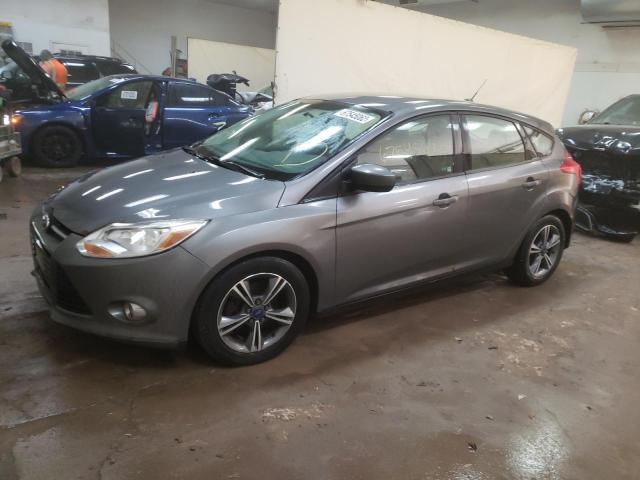 FORD FOCUS SE 2012 with VIN 1FAHP3K2XCL354728 - Photo from auction
