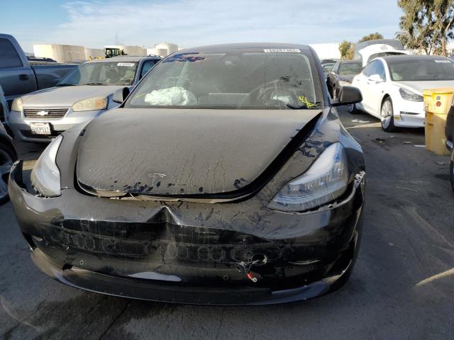 Photo 5 from auction – 2019 TESLA MODEL 3 with VIN 5YJ3E1EB0KF385191