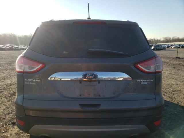 Zdjęcie 6 z aukcji – 2014 FORD ESCAPE TIT z VIN 1FMCU9J96EUD69606