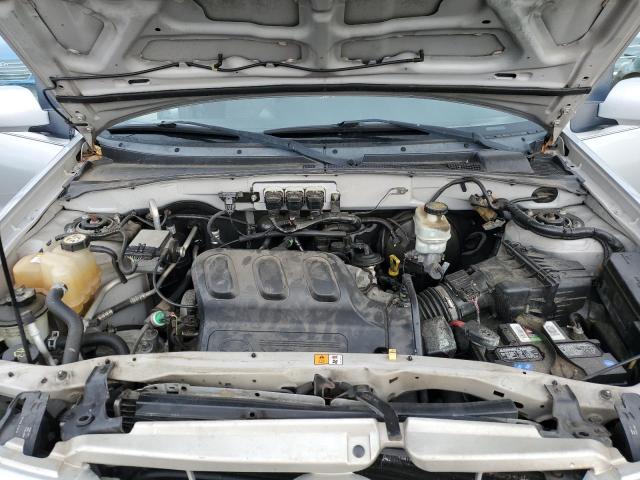 Photo 12 from auction – 2005 MAZDA TRIBUTE S with VIN 4F2YZ04115KM30871