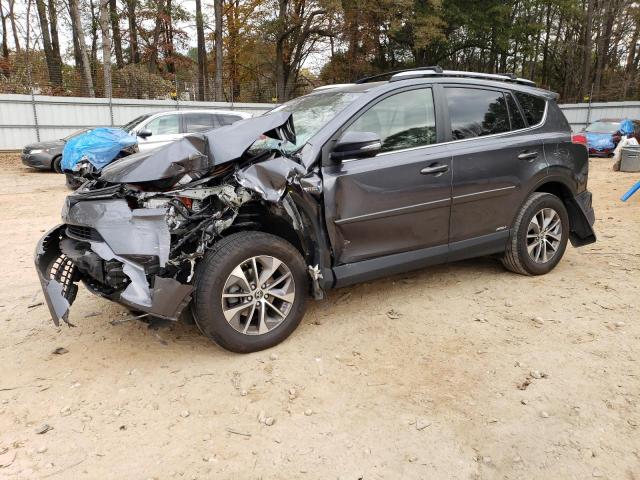 TOYOTA RAV4 HV LE 2018 with VIN JTMRJREV8JD214483 - Photo from auction