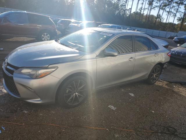 TOYOTA CAMRY LE 2017 with VIN 4T1BF1FK0HU746387 - Photo from auction