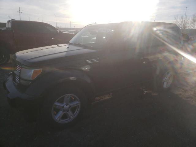DODGE NITRO SXT 2011 with VIN 1D4PU5GK4BW568245 - Photo from auction