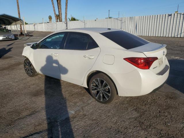 Photo 2 from auction – 2017 TOYOTA COROLLA L with VIN 5YFBURHE9HP668401
