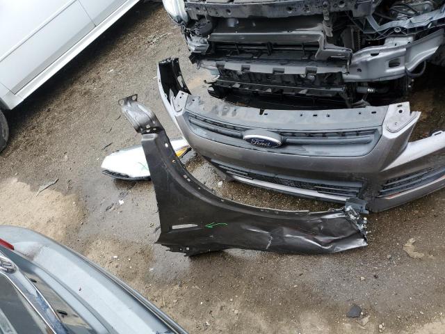 Photo 13 from auction – 2013 FORD ESCAPE S with VIN 1FMCU0F77DUC08151