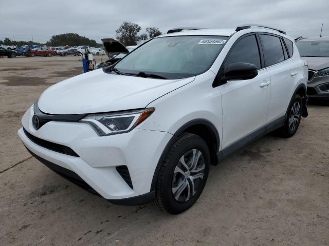 TOYOTA RAV4 LE 2018 with VIN 2T3ZFREVXJW443395 - Photo from auction