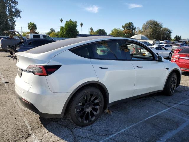 Photo 3 from auction – 2021 TESLA MODEL Y with VIN 5YJYGDEE1MF130113