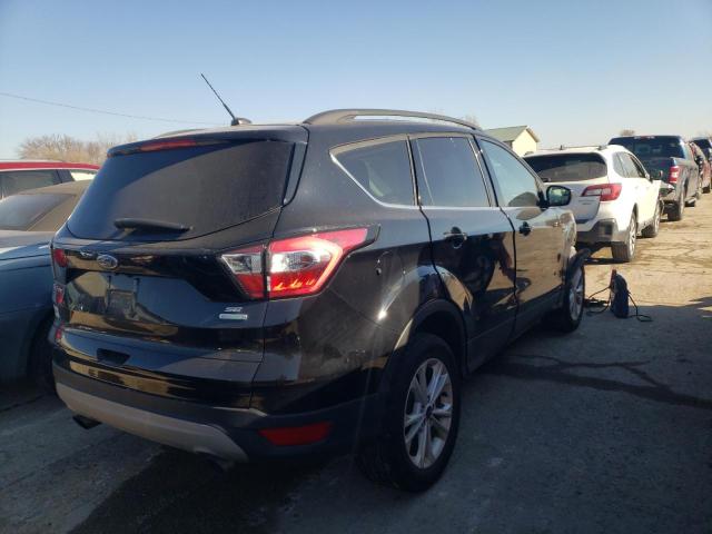 Photo 3 from auction – 2018 FORD ESCAPE SE with VIN 1FMCU0GD1JUD55775