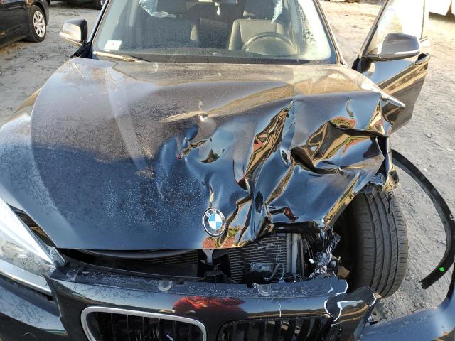 Photo 12 from auction – 2014 BMW X1 XDRIVE2 with VIN WBAVL1C54EVY13794