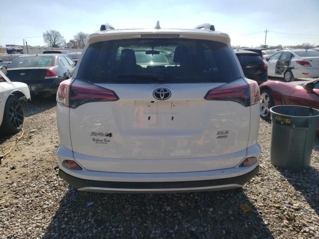 Photo 6 from auction – 2016 TOYOTA RAV4 XLE with VIN 2T3RFREV2GW462564