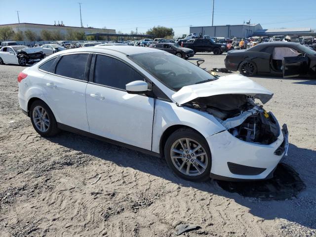 Photo 4 from auction – 2018 FORD FOCUS SE with VIN 1FADP3FE2JL304101