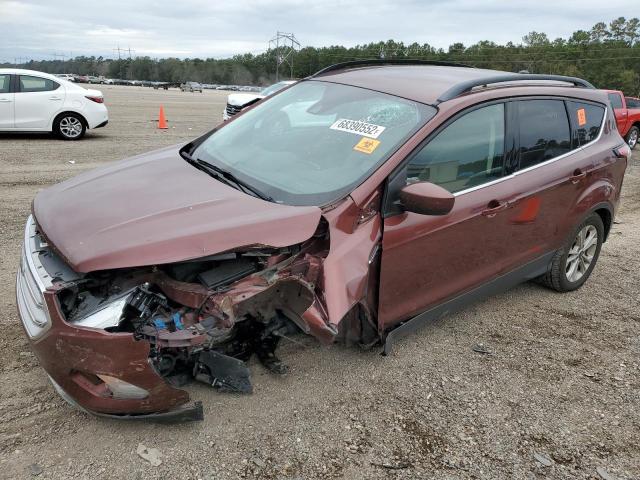 FORD ESCAPE SE 2018 with VIN 1FMCU0GD9JUB85150 - Photo from auction