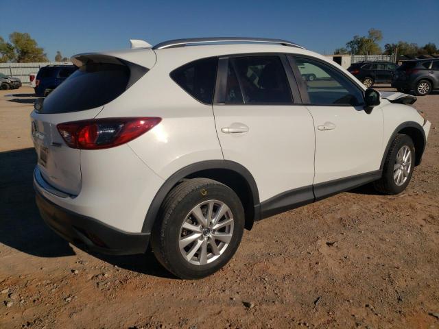 Photo 3 from auction – 2015 MAZDA CX-5 TOURI with VIN JM3KE2CY3F0542958