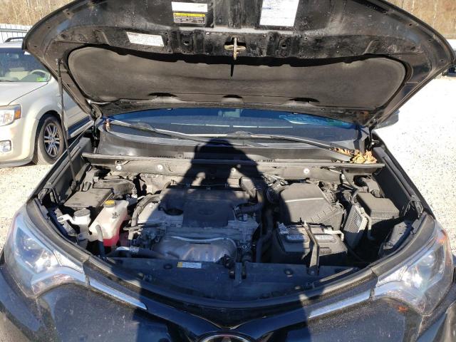 Photo 12 from auction – 2018 TOYOTA RAV4 LE with VIN 2T3BFREV4JW760011