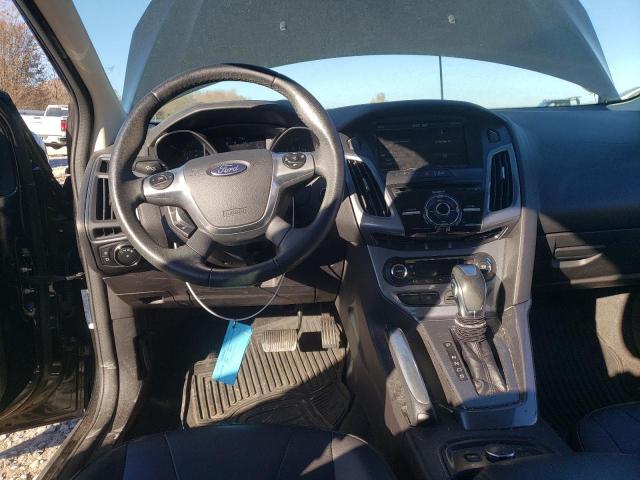 Photo 8 from auction – 2014 FORD FOCUS TITA with VIN 1FADP3N22EL169036