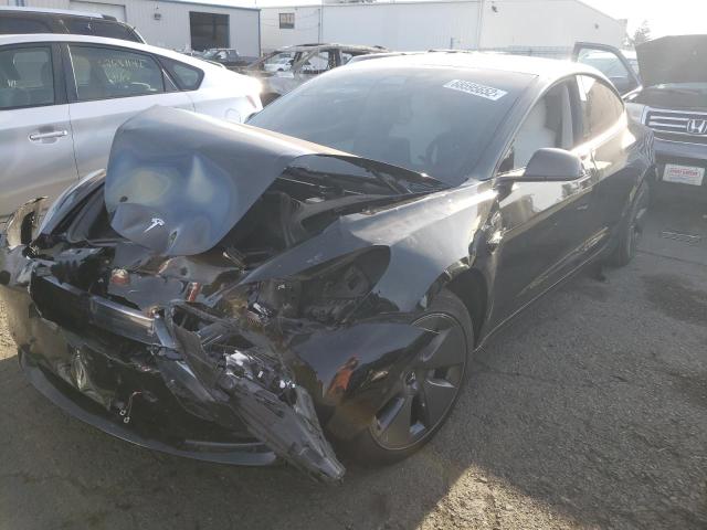 TESLA MODEL 3 2021 with VIN 5YJ3E1EA9MF875090 - Photo from auction
