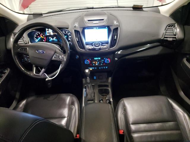 Photo 8 from auction – 2017 FORD ESCAPE TIT with VIN 1FMCU9JDXHUC26084