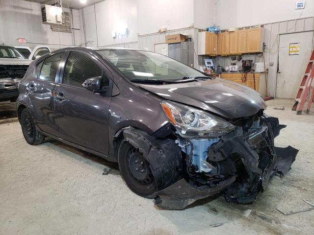 Photo 4 from auction – 2015 TOYOTA PRIUS C with VIN JTDKDTB39F1101949